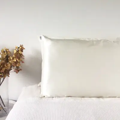 off white silk pillowcase monday silks on bed