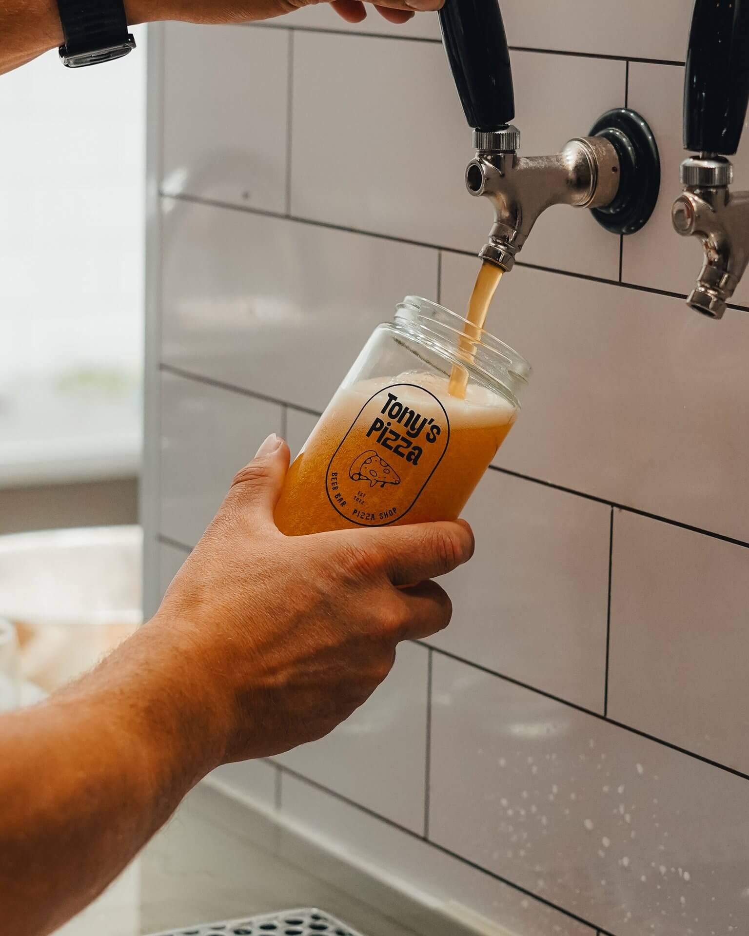 Pouring a pint at Tony's Pizza